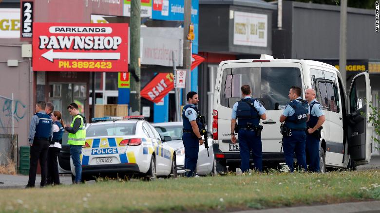 Police stand outside a mosque in Linwood, Christchurch, New Zealand, Friday, March 15, 2019. Multiple people were killed during shootings at two mosques full of people attending Friday prayers. (AP Photo/Mark Baker)