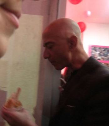 Jeff Bezos awarding himself with ice cream after lover Lauren files for divorce from husband. Also featuring someones lips.