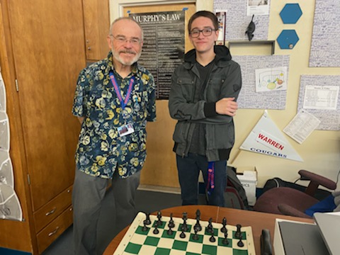 Mr. Warren and one of the students in the chess club.