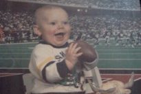 Football lover since Day 1. Hes got the jersey and football and everything!