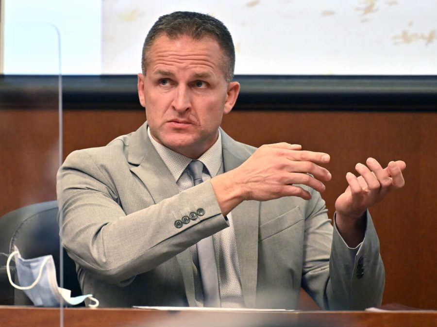 Former Louisville Police officer Brett Hankison talks about seeing a subject in a firing stance in the apartment as he is cross-examined in Louisville, Ky., Wednesday, March 2, 2022. (AP Photo/Timothy D. Easley, Pool)