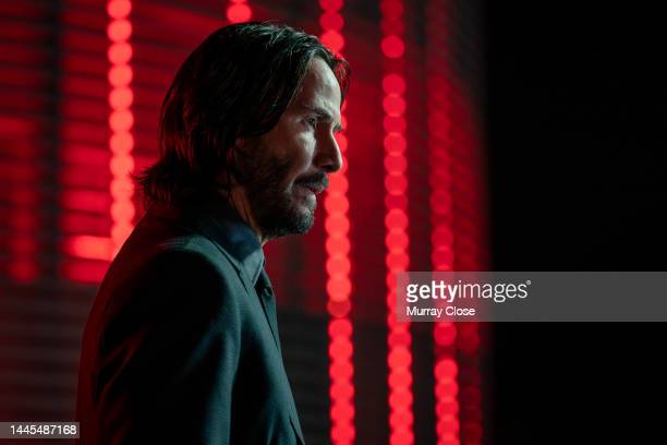Canadian-born actor Keanu Reeves (in costume as John Wick) in a scene from the film John Wick: Chapter 4 (directed by Chad Stahelski), Berlin, Germany, July 2021. The scene, with Berlin standing in for Osaka, Japan, is from the fourth film in the series, set for release in 2023. (Photo by Murray Close/Moviepix/Getty Images)