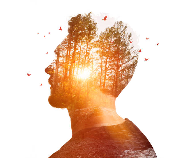 Multiple Exposure of young man and nature at sunset