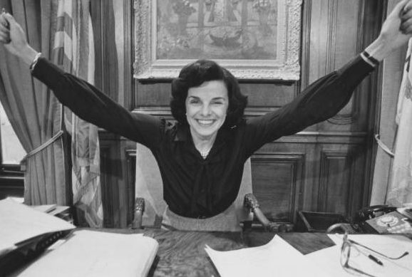 American politician Dianne Feinstein, her arms outstretched in celebration, in her office after she was elected mayor of San Francisco, at San Francisco City Hall in San Francisco, California, circa 1978. (Photo by Nick Allen/Pictorial Parade/Archive Photos/Getty Images)