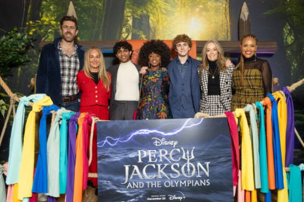 LONDON, ENGLAND - DECEMBER 16: (L to R) Charlie Andrews, Ellen Goldsmith-Vein, Aryan Simhadri, Leah Sava Jeffries, Walker Scobell, Karey Burke and Ayo Davis attend the UK premiere of Disney+ Original series Percy Jackson And The Olympians at Odeon Luxe Leicester Square on December 16, 2023 in London, England. (Photo by Shane Anthony Sinclair/Getty Images)
