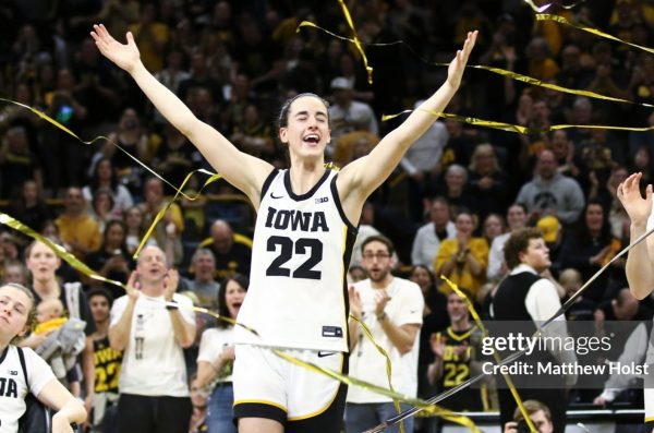 IOWA CITY, IOWA- MARCH 3:  Guard Caitlin Clark #22 and guard Kate Martin #20  of the Iowa Hawkeyes celebrates in the confetti after senior day festivities  after the match-up against the Ohio State Buckeyes at Carver-Hawkeye Arena on March 3, 2024 in Iowa City, Iowa.  (Photo by Matthew Holst/Getty Images)